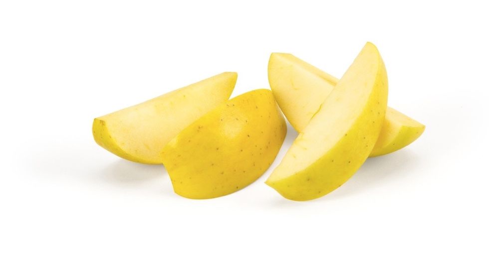 Midwestern shoppers will be able to munch on genetically modified, non-browning apples.