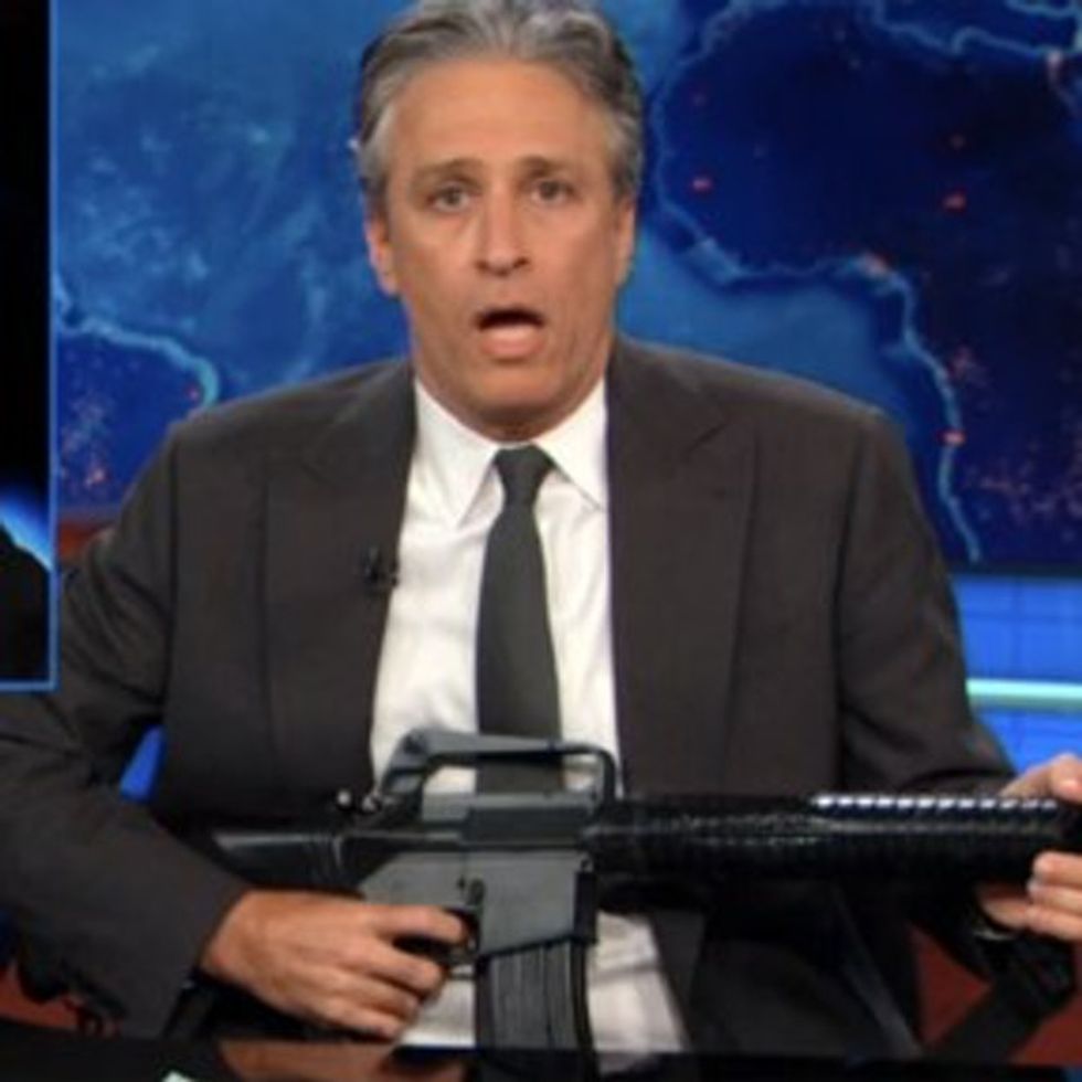 Why Is Jon Stewart Wielding A Gun On Television? Oh, Right. Fox News.