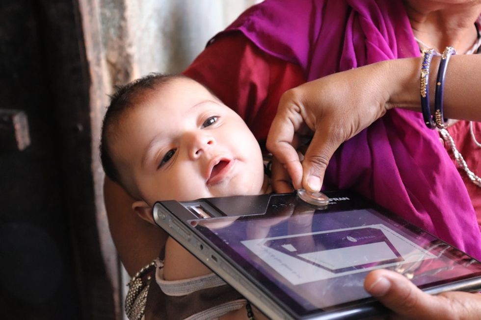The amazing reason mothers in India are giving their babies wearable medical records.