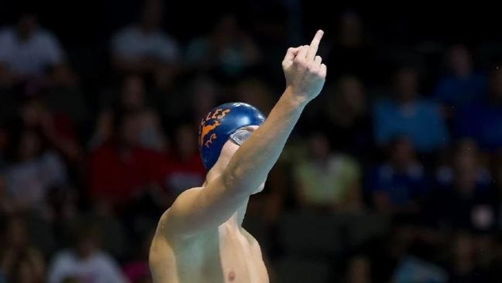 Why this Olympic swimmer gave his dad the middle finger before every race.