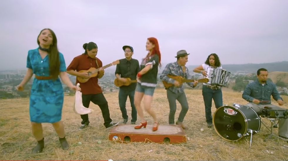 Here's a version of Woody Guthrie's 'This Land Is Your Land' that might just light you right up.