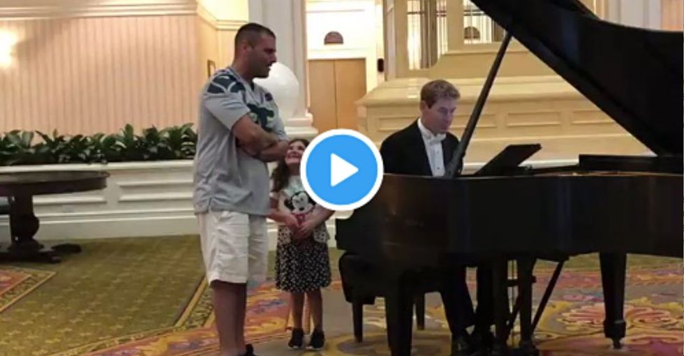 This dad singing 'Ave Maria' at a Disney resort is magic. Just watch his daughter's face.