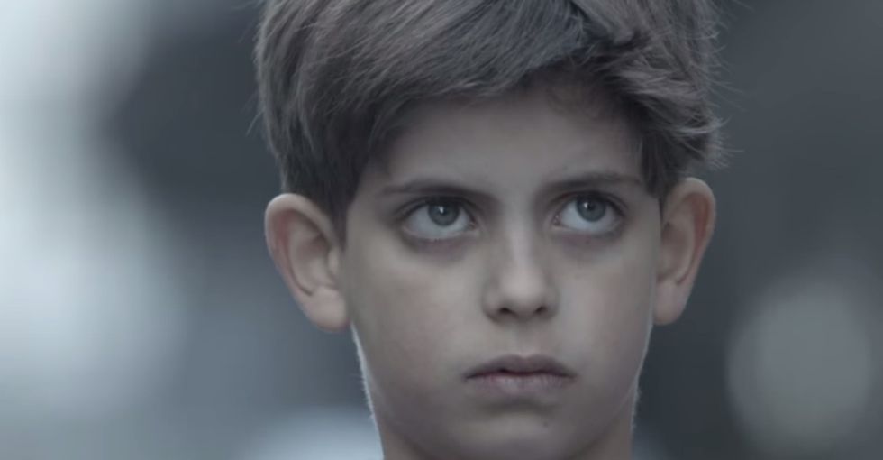 Watch An Abused Child Get A Secret Help Message In Broad Daylight That His Abuser Can't See