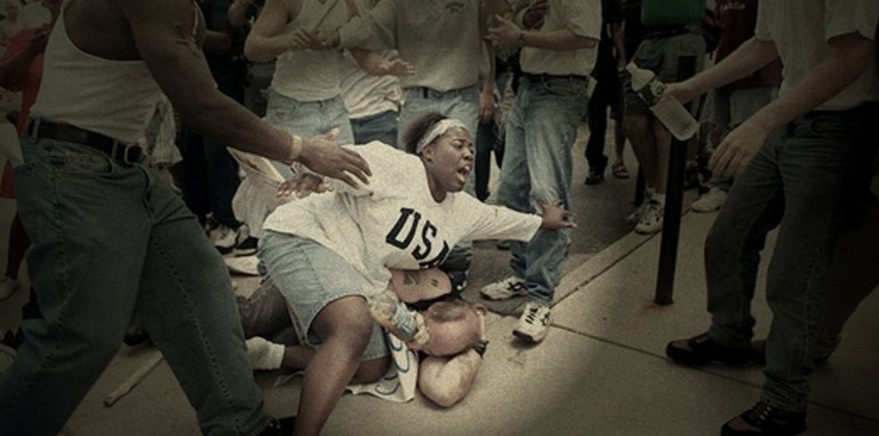 Here's The Moment A Black Woman Protected A White Man At A KKK Rally