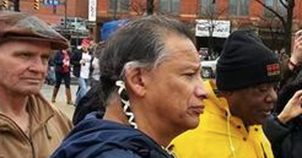 A Stirring Photo Of A Native American Man Confronting A Mascot Based On His Race
