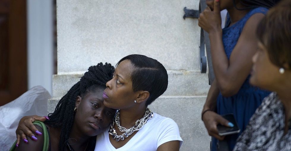 In the wake of tragedy, Charleston mourns as the world reacts.