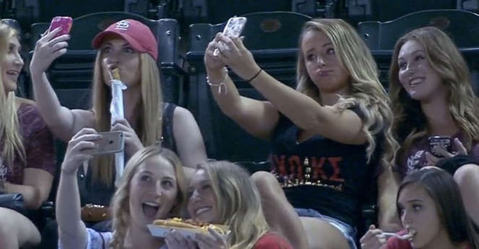 These girls were mocked on TV for taking selfies at a baseball game. Here's why that's not cool.