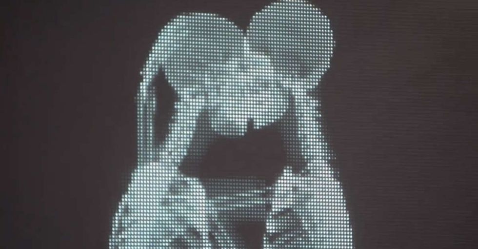 A bunch of skeletons kiss, hug, and dance in a super heartwarming video about love.