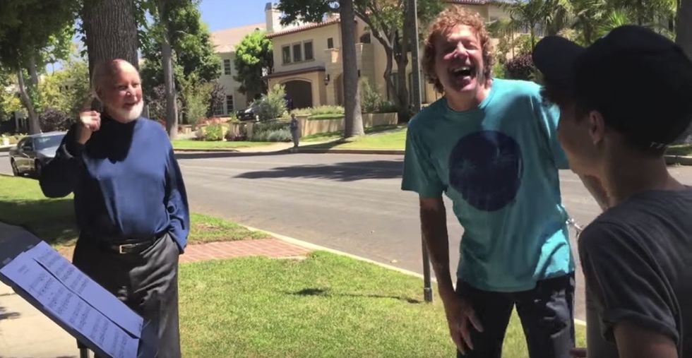 2 fans took a risk by showing up at their hero's house. Then he surprised them.