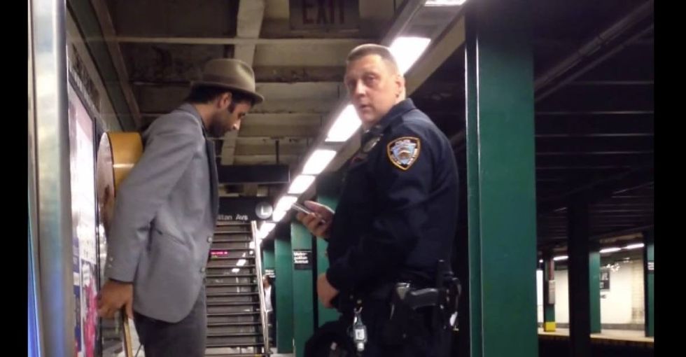 Cop doesn't understand how law works, arrests guy who does for something totally legal.