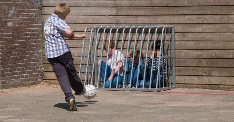 A bully punches him in the face. Later, he follows the bully home, and that's where he sees it.