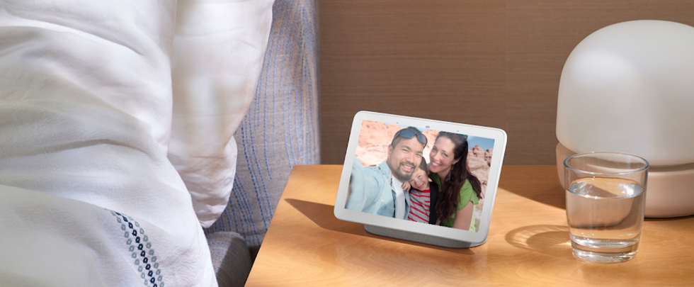 Product image of a Google Home Hub on a bedside table