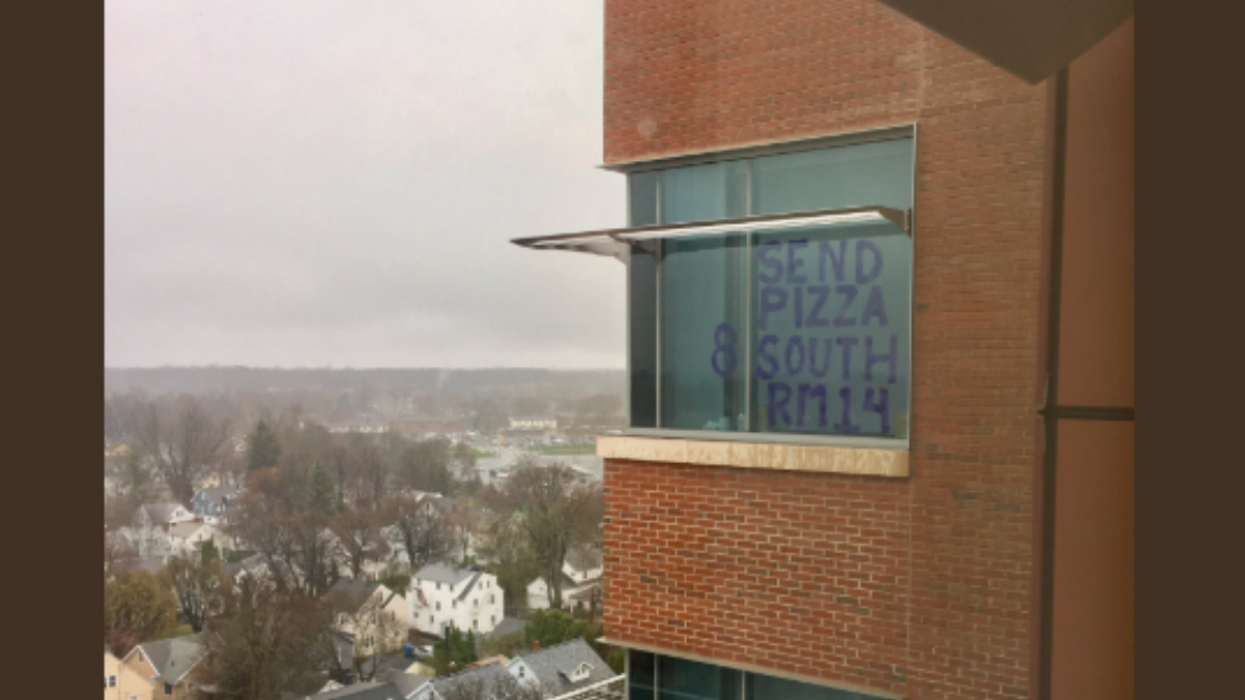 Young Patient Paints 'Send Pizza' On His Hospital Window—And Boy Did The Universe Deliver