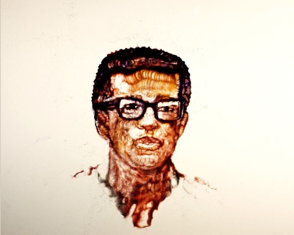 A portrait of Arthur Ashe in "Ashe '68" created using sand animation