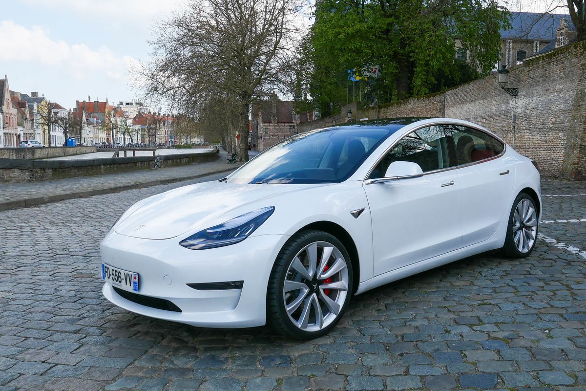 Photo of a white Tesla Model 3