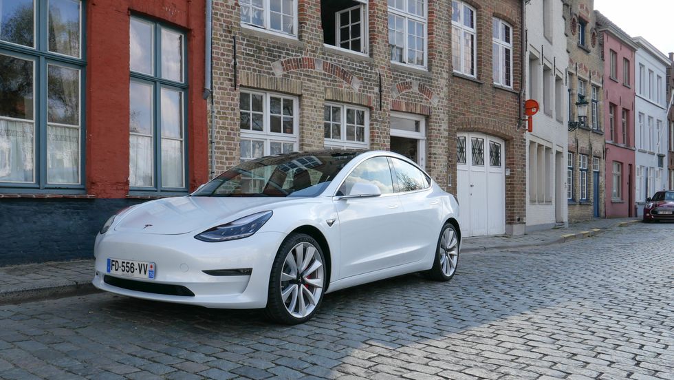 Photo of a white Tesla Model 3