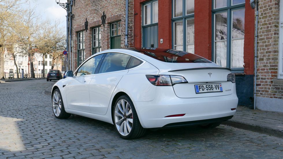 Photo of a white Tesla Model 3