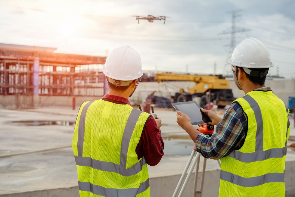 Drone being flown at a construction site