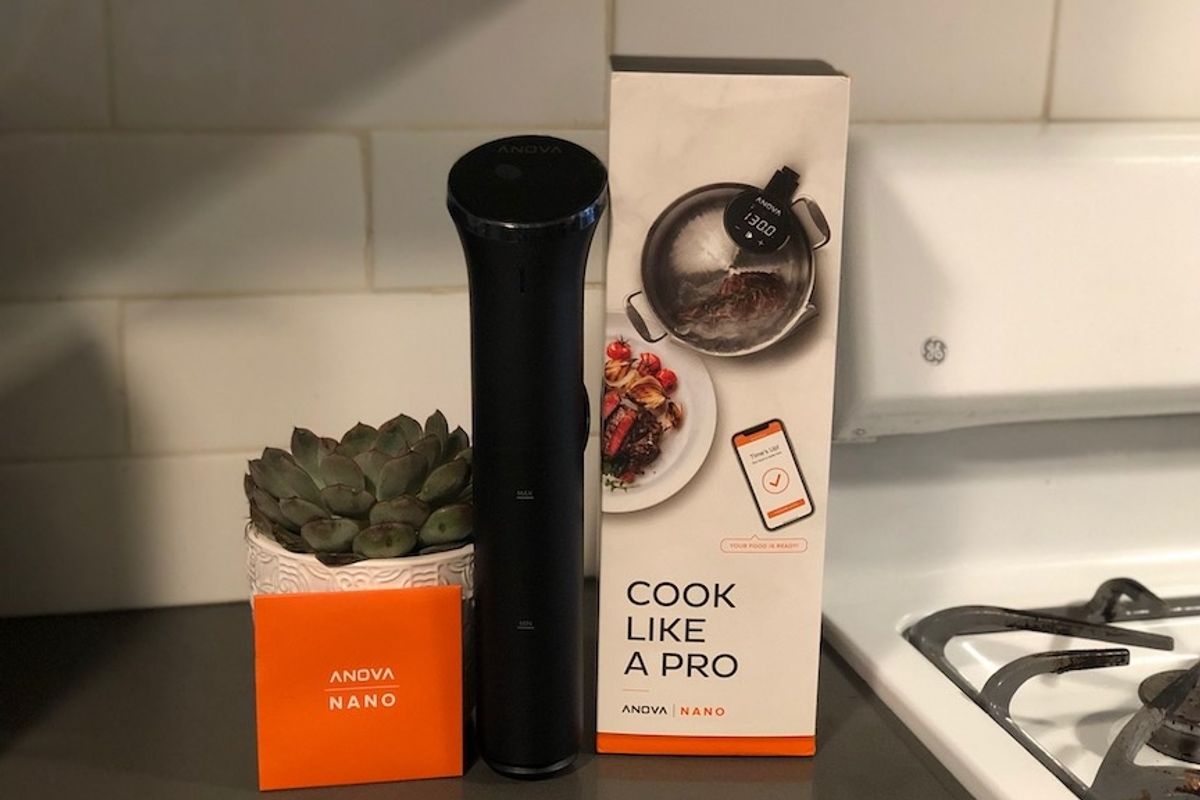 a photo of Anova Nano and box on a kitchen counter.