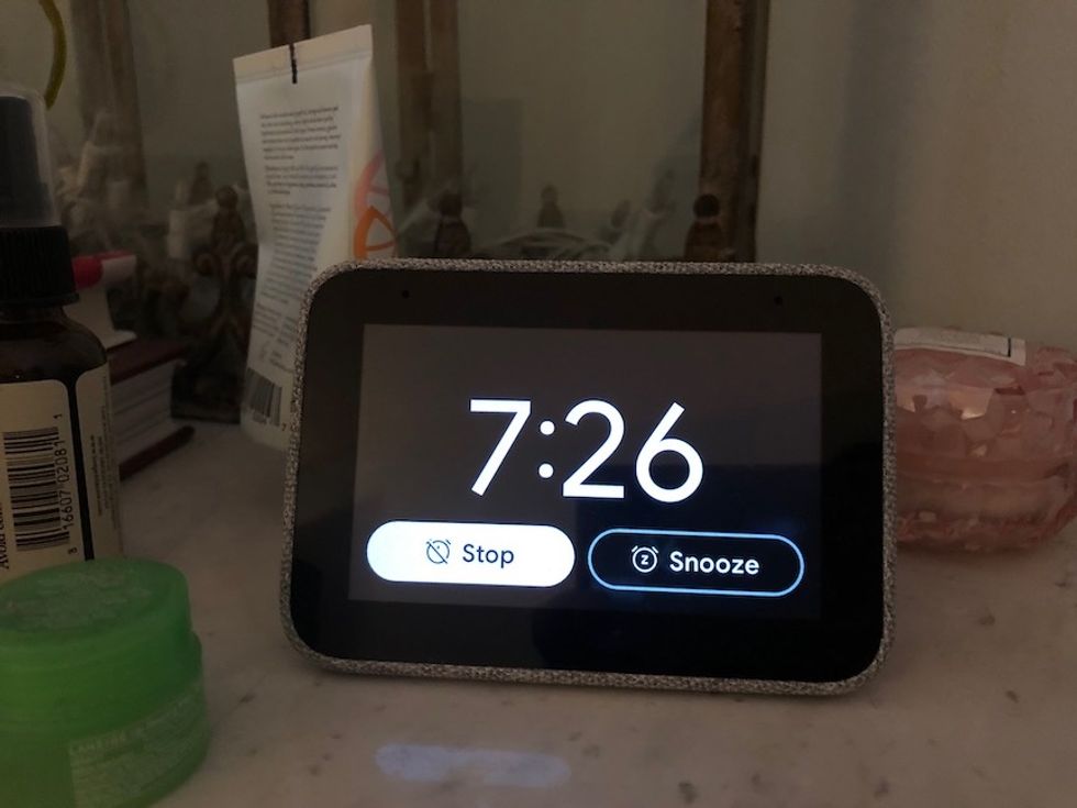 You can snooze or stop the alarm on the Lenovo Smart Clock by tapping the screen, the clock or just asking Google Assistant to stop