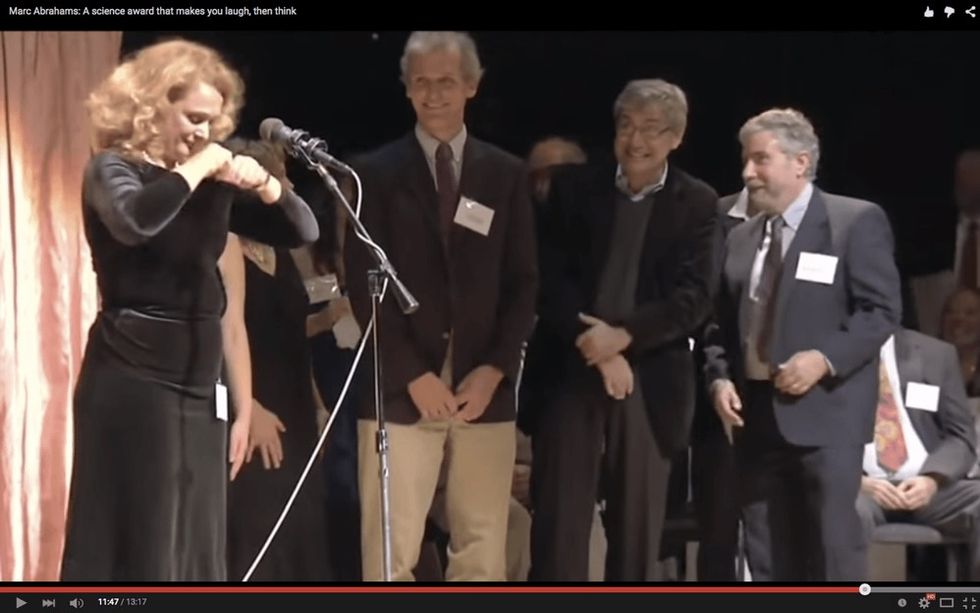She took off her bra and put it over Paul Krugman's face because science.