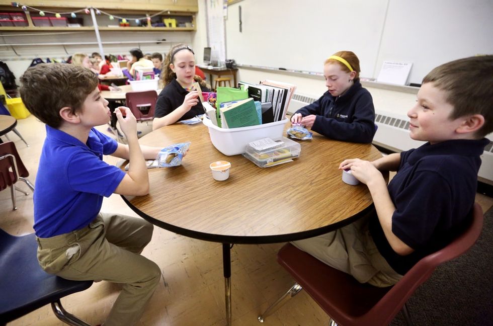 After a story about a boy bringing lunch for his classmate went viral, Reddit responded.