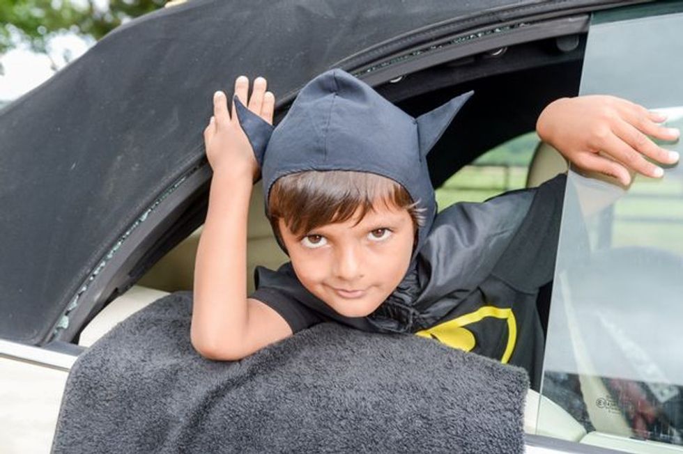 5-year-old saves baby from peril, dressed as Batman. This is not pretend. It really happened.