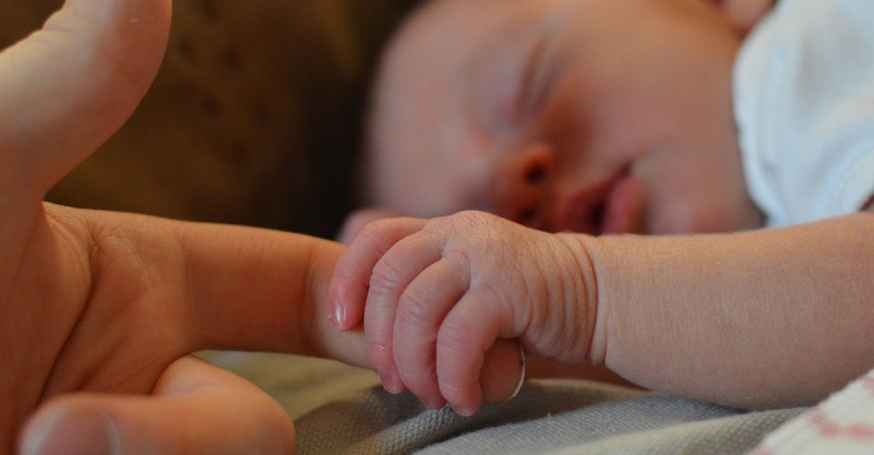 To help her gay son, this amazing mom carried and gave birth to her own granddaughter.