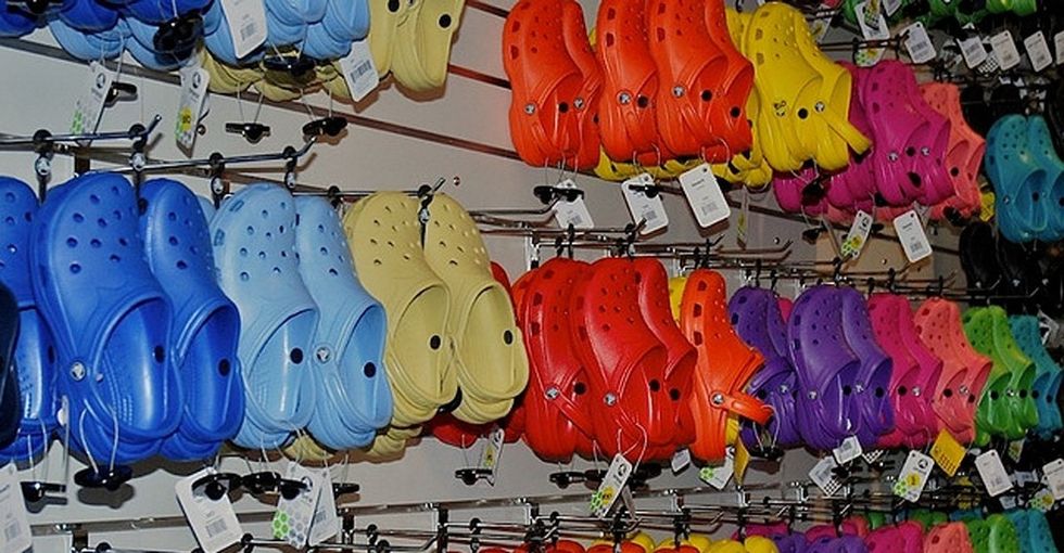 Why are 34,000 people being forced to wear orange Crocs?