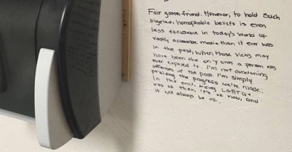 It's a homophobic message on a bathroom wall. But then it gets better. And then ... oh snap.