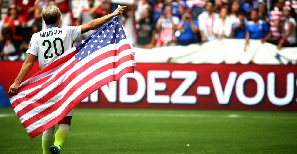 It was the kiss seen around the world. How Abby Wambach is challenging homophobia in sports.