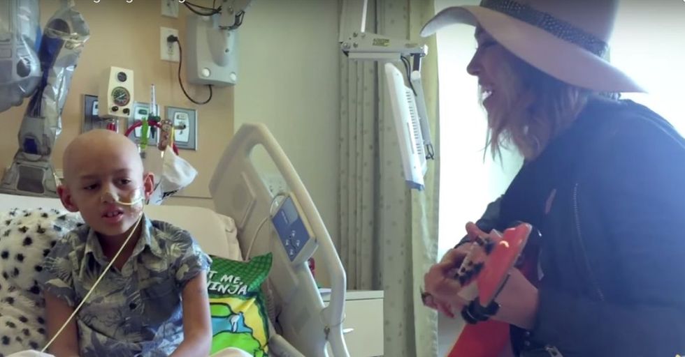 A singer of a popular song got invited to her fan's bedside. Her song took on a whole new meaning.