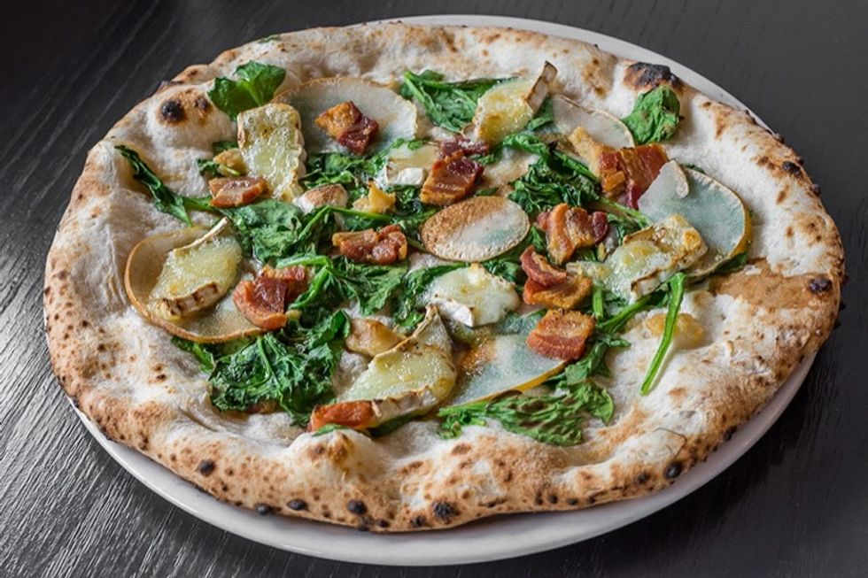 A pizza place with all deaf employees is pretty special. Because their pizza is so good.