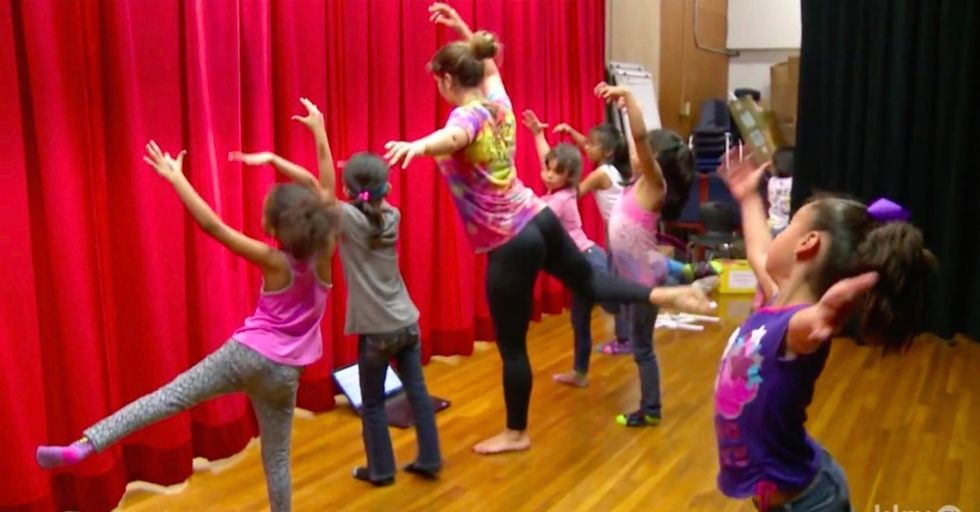 A dance class for young girls learning to speak English. It's fun, and it works.