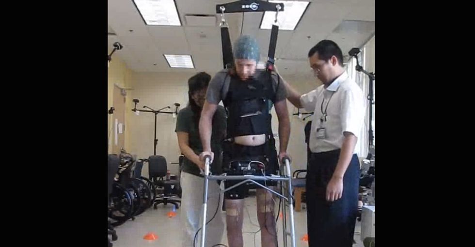 He's been paralyzed for 5 years, but he just walked. The video is spectacular.