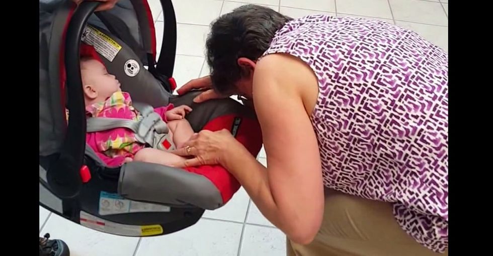 She opened up a gift bag and learned she was a grandma. Her reaction is the best!