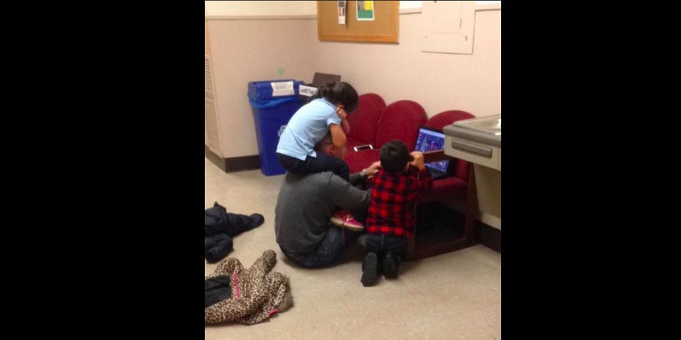One photo captures the power of a teacher's support — and it's making the rounds.