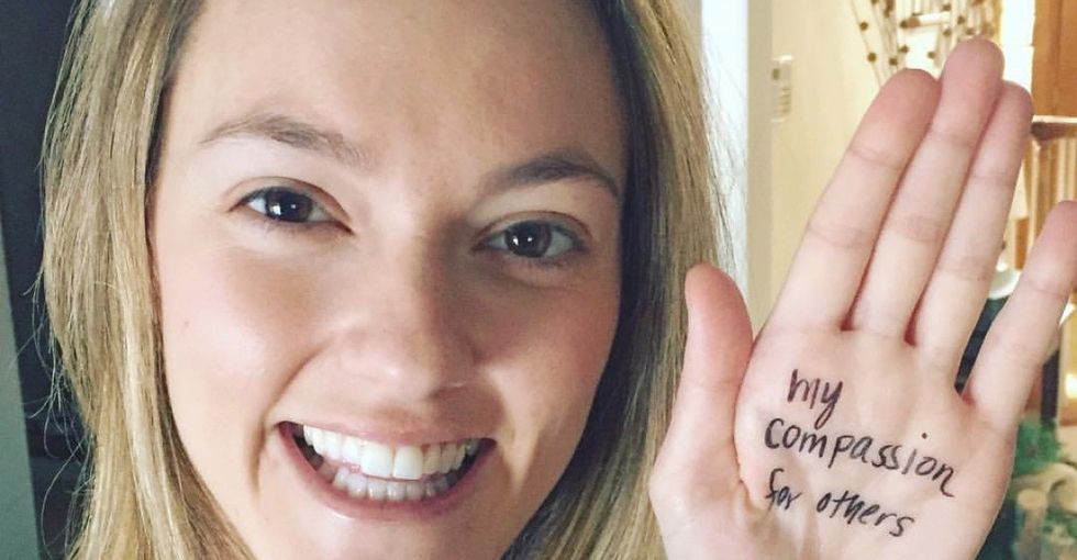 The sweet reason strangers are writing on their hands to support one another.