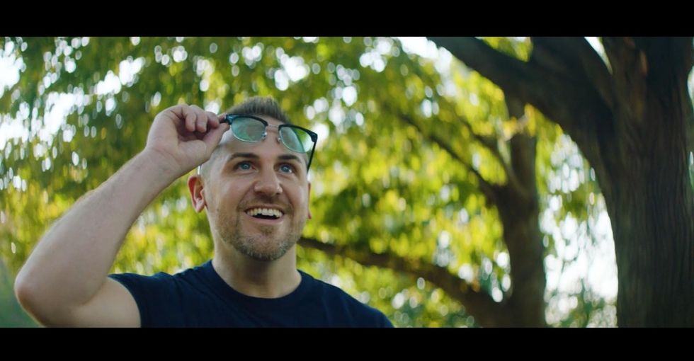 These glasses help colorblind people see colors. Watch this guy put them on.