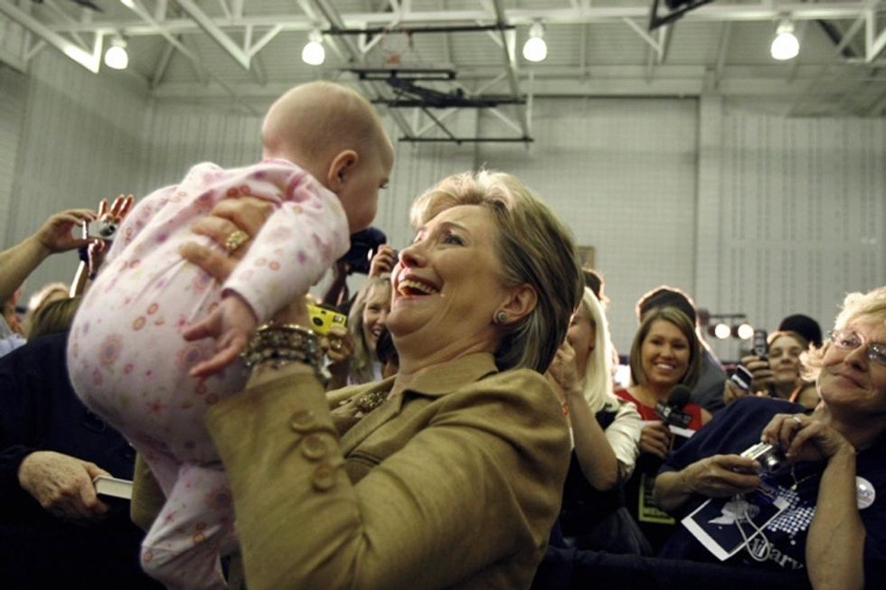 Ever wonder why politicians kiss babies? The answer is weirder than you think.