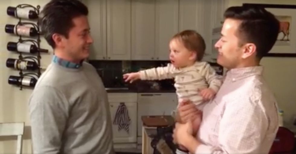 Baby meets his dad's twin brother in an adorable viral video.