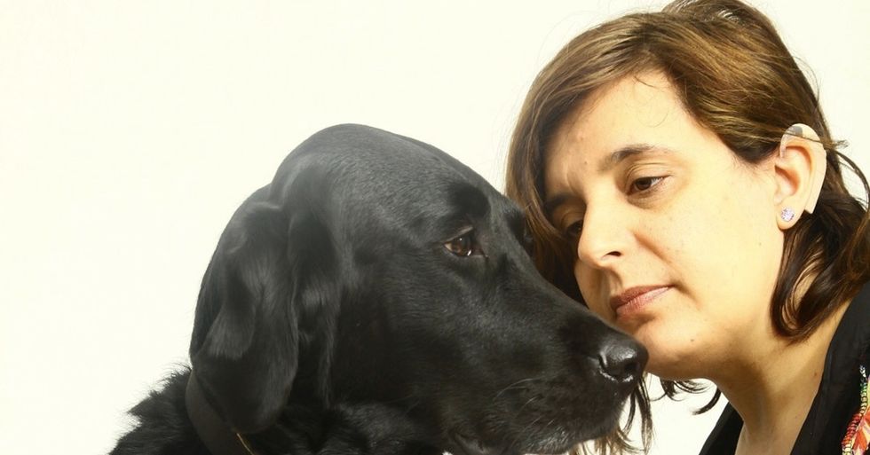 Why did Lisa shy away from cochlear implants? And what changed her mind?