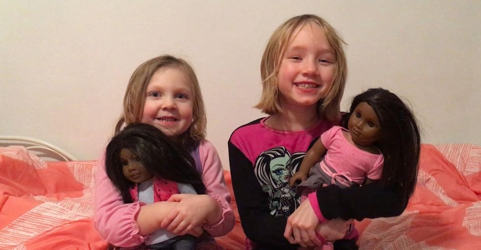 Two white girls were given black dolls and reacted oppositely. Here's why.