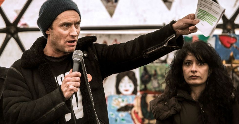 7 photos from Jude Law's trip to a migrant camp in France.