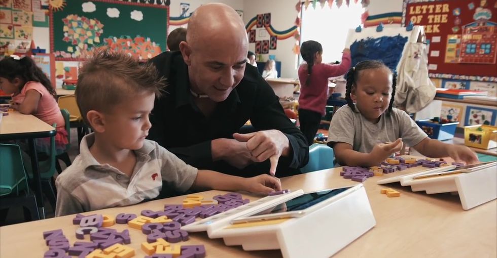 Tennis legend Andre Agassi is trying to teach kids to read in a new, very fascinating way.