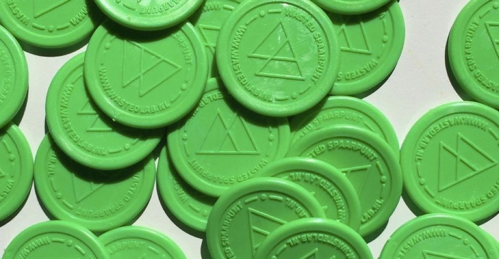 The cool reason why these green coins are becoming a currency in Amsterdam.