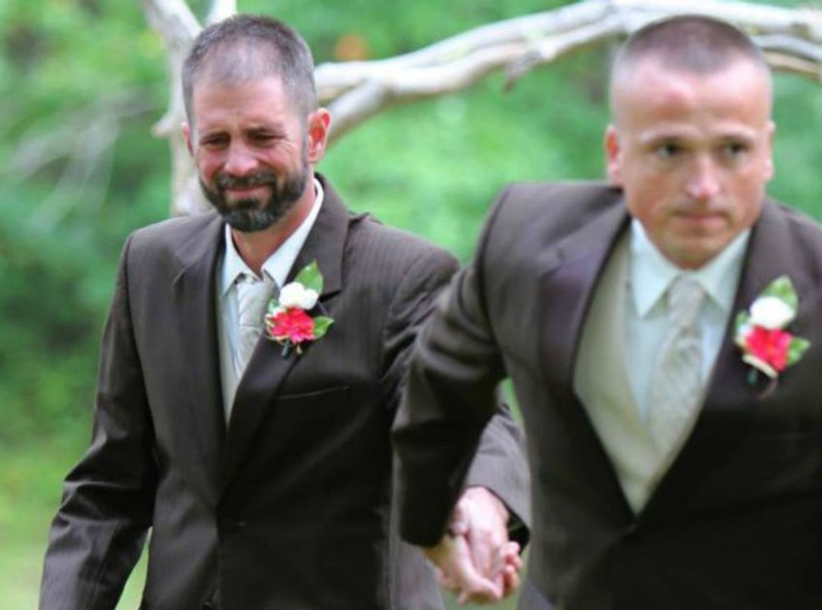 two men in tuxedos at a wedding