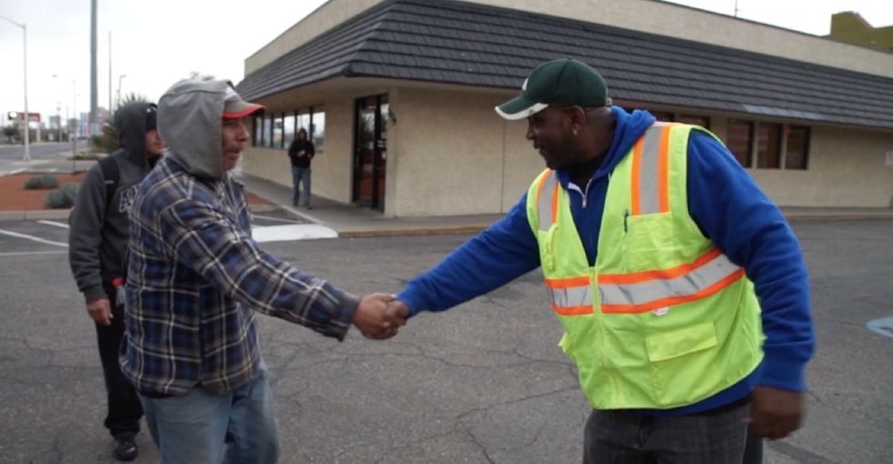 Here's how one city's plan to pay panhandlers for work is doing a year later.