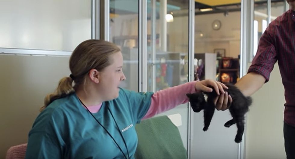 Meet Jordan, whose love of black cats helps her speak.