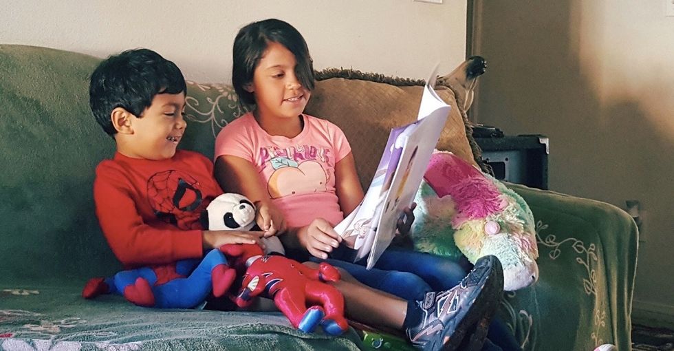 When older siblings read to younger ones, great things happen.